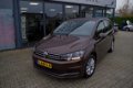 Volkswagen Touran - 1.2 TSI Comf. 7p NAVI/PDC/TREKHAAK/STANDKACHEL - 1 - Thumbnail