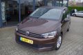 Volkswagen Touran - 1.2 TSI Comf. 7p NAVI/PDC/TREKHAAK/STANDKACHEL - 1 - Thumbnail