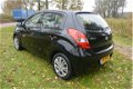 Hyundai i20 - 1.2i DynamicVersion *airco*5drs*2de eigenaar - 1 - Thumbnail