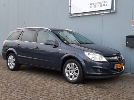 Opel Astra - 1.8i-16V Edition Navigatie/Leer/Automaat/16inch - 1