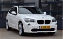 BMW X1 - SDrive18i Executive * AUTOMAAT * PANORAMA * NAVIGATIE * KETTING VERVANGEN - 1 - Thumbnail