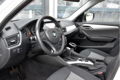 BMW X1 - SDrive18i Executive * AUTOMAAT * PANORAMA * NAVIGATIE * KETTING VERVANGEN - 1 - Thumbnail