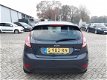 Ford Fiesta - 1.25 Titanium - 5 DRS - 82PK - AIRCO - 1 - Thumbnail