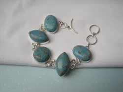 Armband verzilverd met blauw en bruin/goud adertje stenen 17-18.5 cm