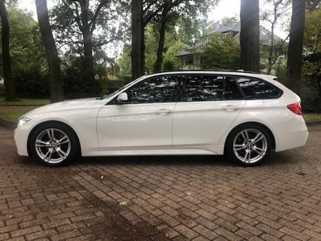 BMW 3-serie Touring - 330d High Executive M Styling/Panoramadak/Alcantara/NIEUWSTAAT/Inruil mogelijk - 1