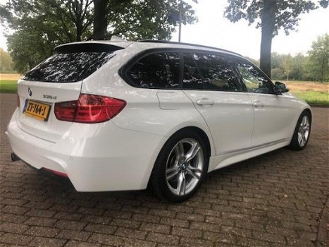 BMW 3-serie Touring - 330d High Executive M Styling/Panoramadak/Alcantara/NIEUWSTAAT/Inruil mogelijk - 1