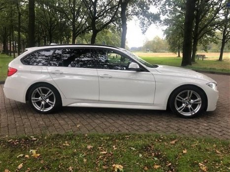 BMW 3-serie Touring - 330d High Executive M Styling/Panoramadak/Alcantara/NIEUWSTAAT/Inruil mogelijk - 1