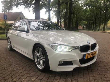 BMW 3-serie Touring - 330d High Executive M Styling/Panoramadak/Alcantara/NIEUWSTAAT/Inruil mogelijk - 1