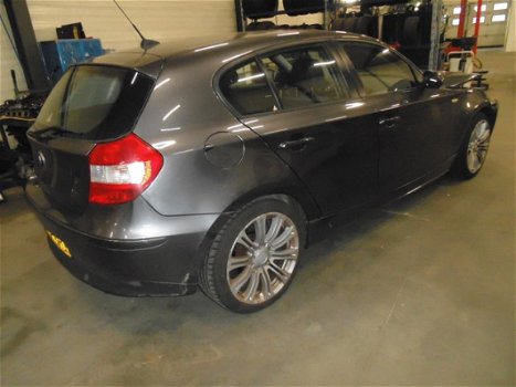 BMW 1-serie - 118i High Executive MET PLAATSCHADE VOORZIJDE - 1