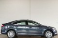 Ford Mondeo - 1.6 TDCi ECOnetic Lease Platinum CLIMA / CRUISE / LMV / PDC / XENON ADAPTIEF / LEER-AL - 1 - Thumbnail