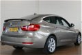 BMW 3-serie Gran Turismo - 320d High Executive CLIMA / CRUISE / LMV / PDC / NAVI PROF. / LEER / XENO - 1 - Thumbnail