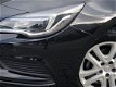 Opel Astra - 1.0T 105PK Online Edition | Navigatie | Sensoren Voor + Achter | - 1 - Thumbnail