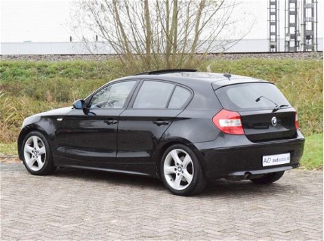 BMW 1-serie - 120i High Executive automaat / eerste eigenaar / navigatie / leer / glazen schuifdak / - 1