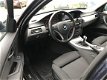 BMW 3-serie Touring - 318i Business Line Trekhaak, Navigatie, Xenon, Clima, Cruise, etc - 1 - Thumbnail