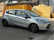 Ford Fiesta - 1.25 86 PK 5-drs - airco - LMV 16'' - Winterbanden - 1 - Thumbnail