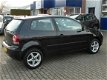 Volkswagen Polo - 1.2 Comfortline 44KW - airco - pdc - lmv - 1 - Thumbnail