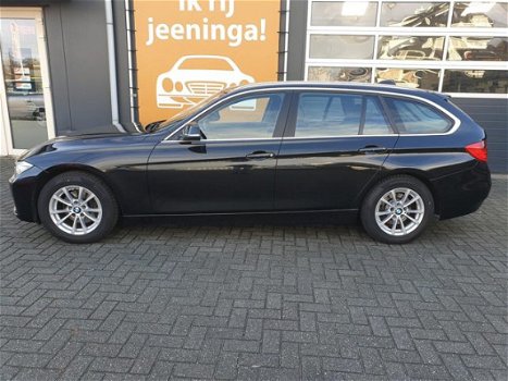BMW 3-serie Touring - 320d High Executive met Afneembare trekhaak, PDC, Navigatie, Climate & Cruise - 1