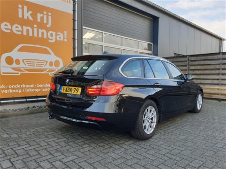 BMW 3-serie Touring - 320d High Executive met Afneembare trekhaak, PDC, Navigatie, Climate & Cruise - 1