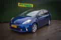 Toyota Prius Wagon - 1.8 Hybrid 7-pers. + Navi / Camera / Panoramadak / 17inch - 1 - Thumbnail