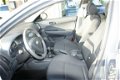 Hyundai i30 - 1.4i Dynamic Airco , parkeersensoren - 1 - Thumbnail