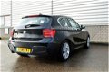 BMW 1-serie - 114i Upgrade Edition M-Sport RIJKLAAR PRIJS-GARANTIE Leder Sport Interieur Navigatie X - 1 - Thumbnail