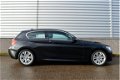 BMW 1-serie - 114i Upgrade Edition M-Sport RIJKLAAR PRIJS-GARANTIE Leder Sport Interieur Navigatie X - 1 - Thumbnail