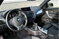 BMW 1-serie - 114i Upgrade Edition M-Sport RIJKLAAR PRIJS-GARANTIE Leder Sport Interieur Navigatie X - 1 - Thumbnail