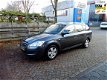 Kia Cee'd Sporty Wagon - 1.4 X-tra goed onderhoudende auto - 1 - Thumbnail