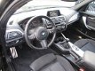 BMW 1-serie - 116i M-PAKKET/XENON/PDC/ECC/NAVI/KEY-LESS - 1 - Thumbnail