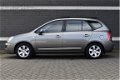 Kia Carens - X-ecutive Automaat / Navi / Cruise / PDC - 1 - Thumbnail