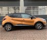 Renault Captur - 1.2 TCe Intens Hoge Instap 2017 km 14.000 nap 1e eigenaar Dealer onderhouden Nwe mo - 1 - Thumbnail