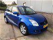 Suzuki Swift - 1.3 Comfort [5-drs/climate control] - 1 - Thumbnail