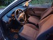 Opel Corsa - 1.2i-16V Strada Airco/nieuwe apk/stuurbekrachtiging - 1 - Thumbnail