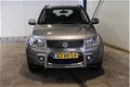 Suzuki Grand Vitara - 1.9 Exclusive 4wd - Airco, Cruise, Trekhaak - 1 - Thumbnail