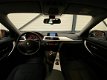 BMW 3-serie - 316i High Executive / XENON / 19 INCH LICHTMETAAL / NAVI / STOEL VERWARMING - 1 - Thumbnail