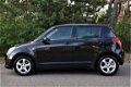 Suzuki Swift - 1.5 GLS/5-DEURS/AIRCO/LMV/STOELVERWARMING - 1 - Thumbnail