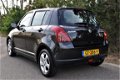 Suzuki Swift - 1.5 GLS/5-DEURS/AIRCO/LMV/STOELVERWARMING - 1 - Thumbnail