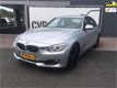 BMW 3-serie - 320i High Executive PDC/Multimedia/Xenon/18Inch velgen - 1 - Thumbnail