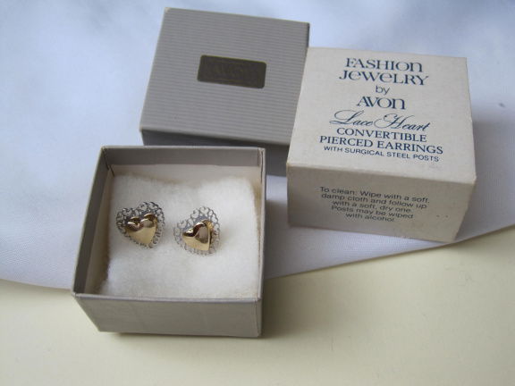 Oorbellen Avon zilverkleurig en goudkleurige hartjes 1.3x1.2 cm - nr. 1