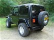 Jeep Wrangler - 4.0i HARDTOP / NIEUWE SOFT TOP AUTOMAAT AIRCO WARN LIERBUMPER+LIER VERHOOGD - 1 - Thumbnail