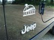 Jeep Wrangler - 4.0i HARDTOP / NIEUWE SOFT TOP AUTOMAAT AIRCO WARN LIERBUMPER+LIER VERHOOGD - 1 - Thumbnail