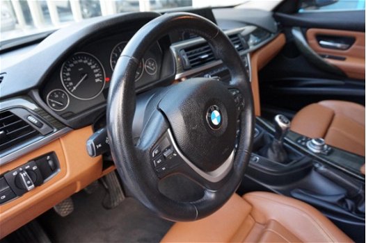 BMW 3-serie - 320i EfficientDynamics Edition Executive Navigatie / leer - 1