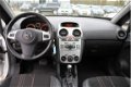 Opel Corsa - 1.4-16V Cosmo airco, radio cd speler, automaat, cruise control, elektrische ramen, schu - 1 - Thumbnail