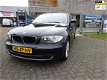 BMW 1-serie - 116i Business Line 5 deuren, Navi , Clima, isofix - 1 - Thumbnail