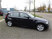 BMW 1-serie - 116i Business Line 5 deuren, Navi , Clima, isofix - 1 - Thumbnail