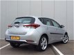 Toyota Auris - 1.3 VVT-i 99pk Now (LAGE KM) - 1 - Thumbnail