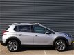 Peugeot 2008 - 1.2 PureTech 110pk Allure | Pano | Clima | NAV | Cruise - 1 - Thumbnail