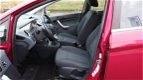 Ford Fiesta - 1.4-16V Titanium 5 DRS * 124.047 KM * Clima * bluetooth * Key-less - 1 - Thumbnail