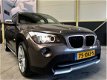 BMW X1 - SDrive20i Automaat | Panoramadak | Navigatie | - 1 - Thumbnail