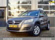 Volkswagen Tiguan - 1.4 TSI Comfort&Design NAVI - 1 - Thumbnail